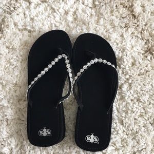 Black flip flops